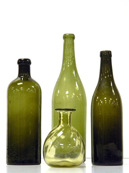 Appraisal: Four early glass bottles including translucent green wine bottle ''