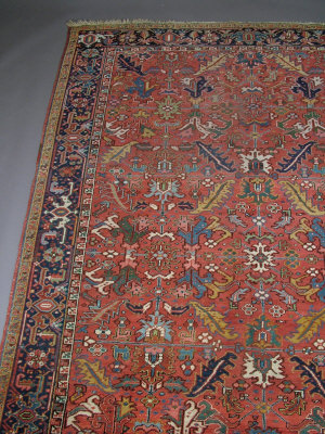 Appraisal: A Heriz carpet with stylised leaves and flowers within an