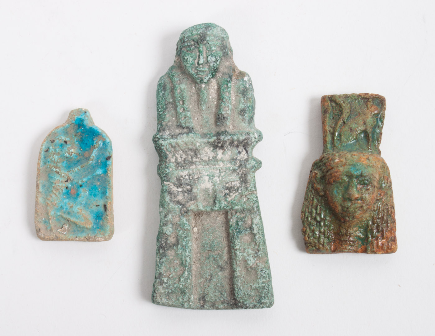 Appraisal: Three ancient Egyptian faience amulets comprising bust of a pharaoh