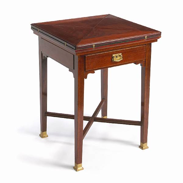 Appraisal: A Vienna Secession mahogany fold over card table designed by