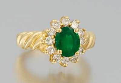 Appraisal: A Ladies' Diamond and Emerald Ring k yellow gold ring