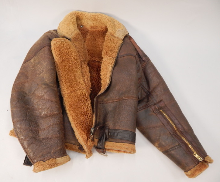 Appraisal: An authentic brown leather fleece lined flying jacket