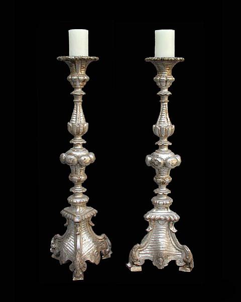 Appraisal: A pair of Italian Baroque parcel gilt and white painted