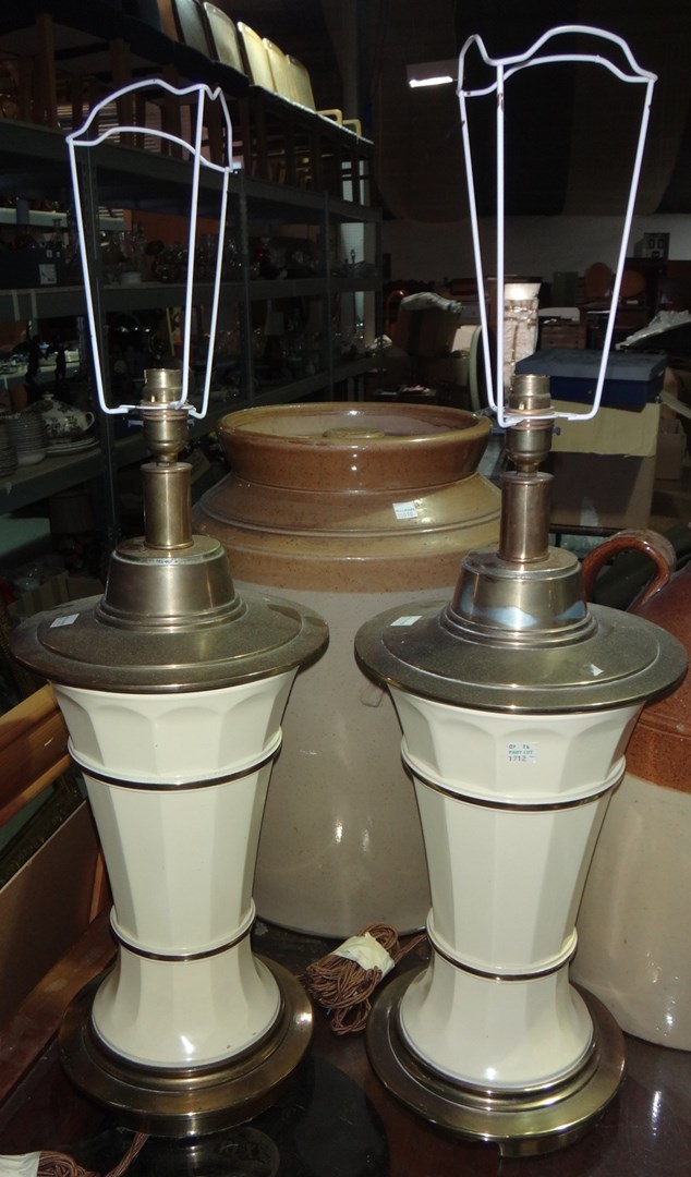 Appraisal: A pair of faceted brass table lamps and a pair