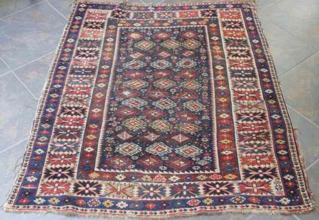 Appraisal: Antique Caucasian Scatter Carpet From a Scarsdale home Dimensions ''