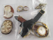 Appraisal: A mixed lot comprising two shell cameos four rings a