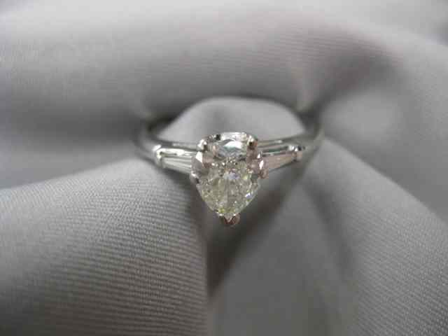 Appraisal: Diamond Platinum Ring carat pear shape diamond with baguette on