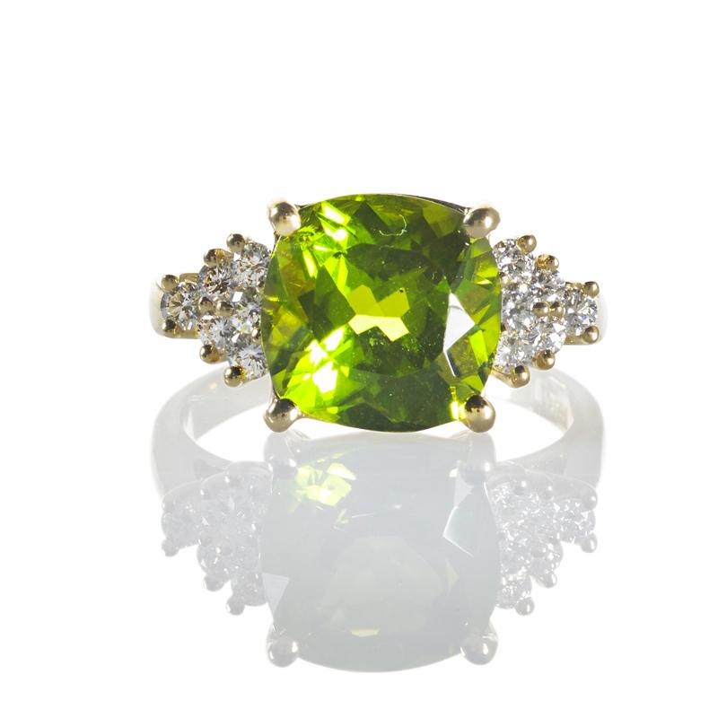 Appraisal: PERIDOT AND DIAMOND K GOLD RING Condition Report VS H-J