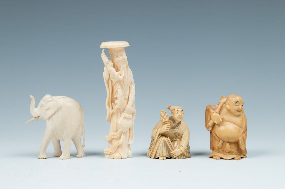 Appraisal: GROUP OF BONE OBJECTS A set of four Japanese ivory