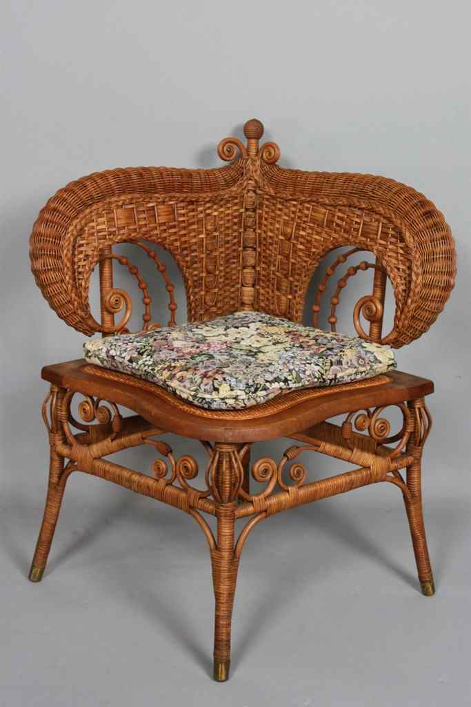 Appraisal: CONTEMPORARY CORNER WICKER CHAIR With downscrolling side joined by a