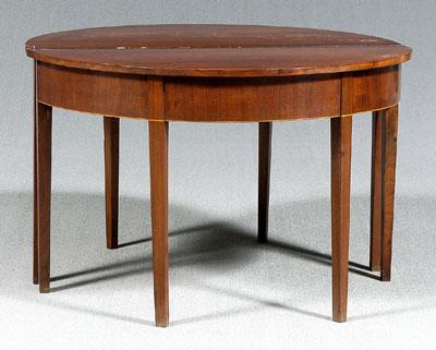 Appraisal: Pair Federal walnut demilune tables each with line inlaid skirt