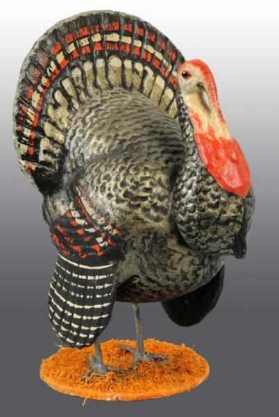 Appraisal: German Thanksgiving Turkey Candy Container Description Painted paper mache and