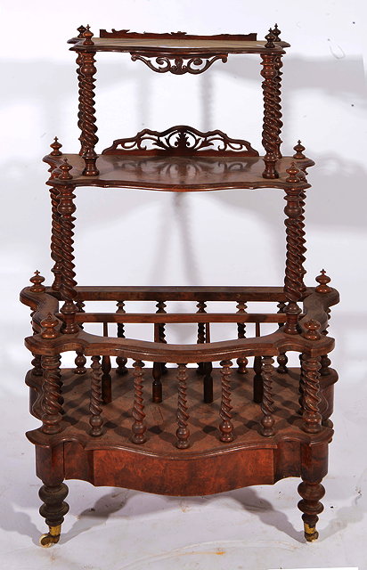 Appraisal: A VICTORIAN BURR WALNUT THREE-TIER SERPENTINE FRONTED CANTERBURY WHATNOT with