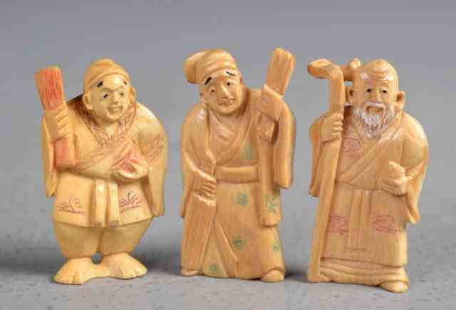 Appraisal: Japanese Carved Ivory NetsukeFinely carved to depict three elders tea