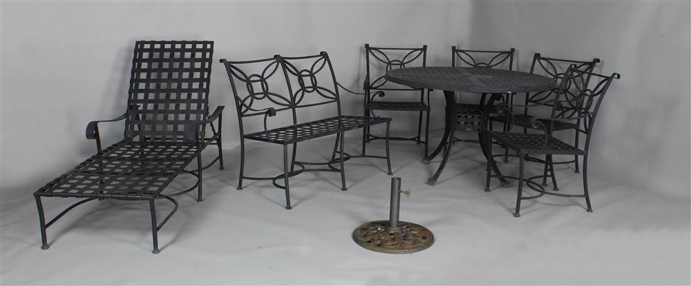 Appraisal: SUITE OF BLACK METAL OUTDOOR FURNITURE comprising a circular table