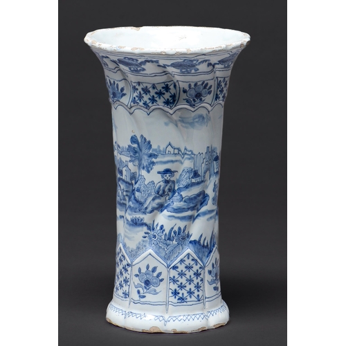 Appraisal: A Dutch delftware spirally lobed sleeve vase late th c