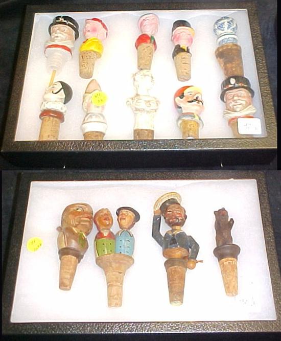 Appraisal: Collection of fourteen carved wood and porcelain bottle stoppers two