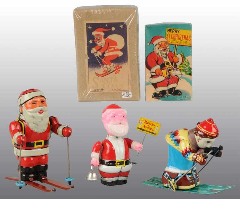 Appraisal: Lot of Tin Litho Santa Claus Skiing Toys Description Japanese