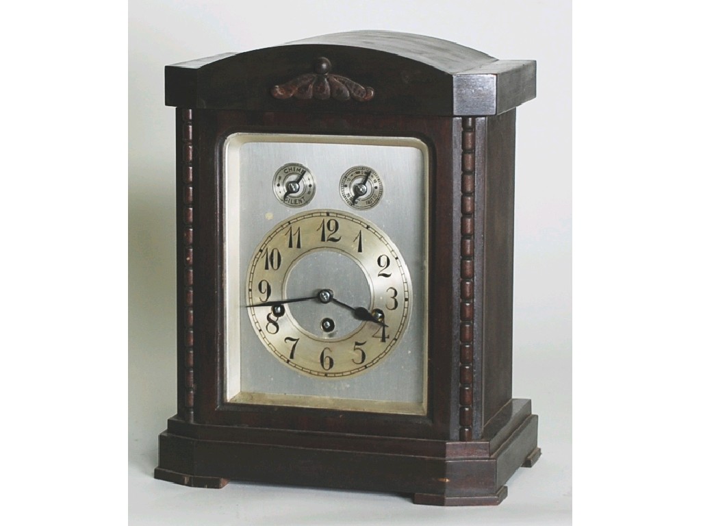 Appraisal: EARLY TWENTIETH CENTURY GERMAN DARK STAINED BEECH MANTEL CLOCK with