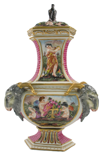 Appraisal: CAPODIMONTE TRI-ANGULAR SHAPED COVERED URN Hand painted with traditional raised