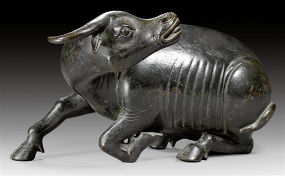 Appraisal: A FINE BRONZE FIGURE OF A RECUMBENT OX China Song