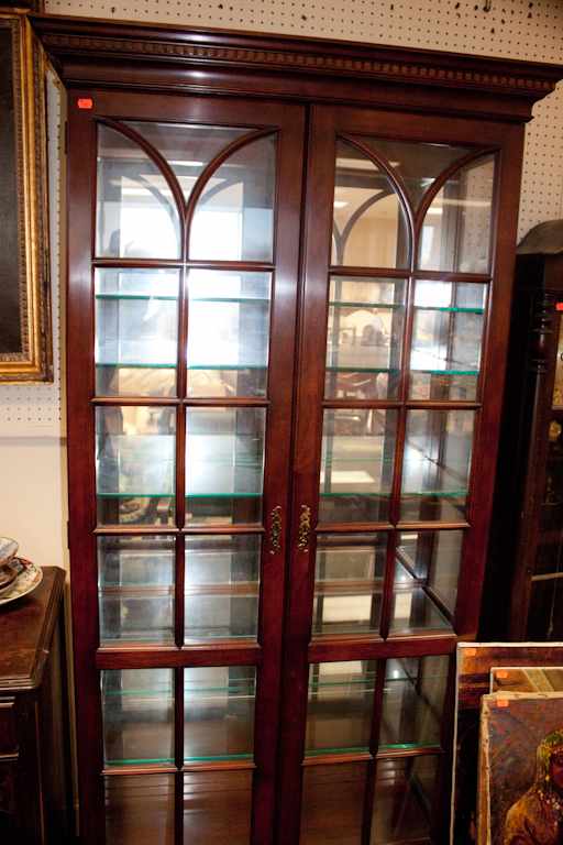 Appraisal: Georgian style mahogany lighted curio cabinet Estimate - No condition