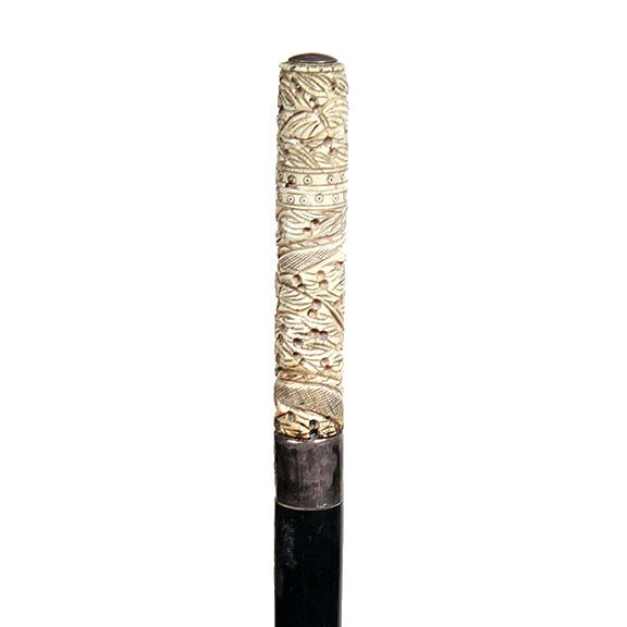 Appraisal: Bone Perfume System Cane Ca - A carved bone compartment