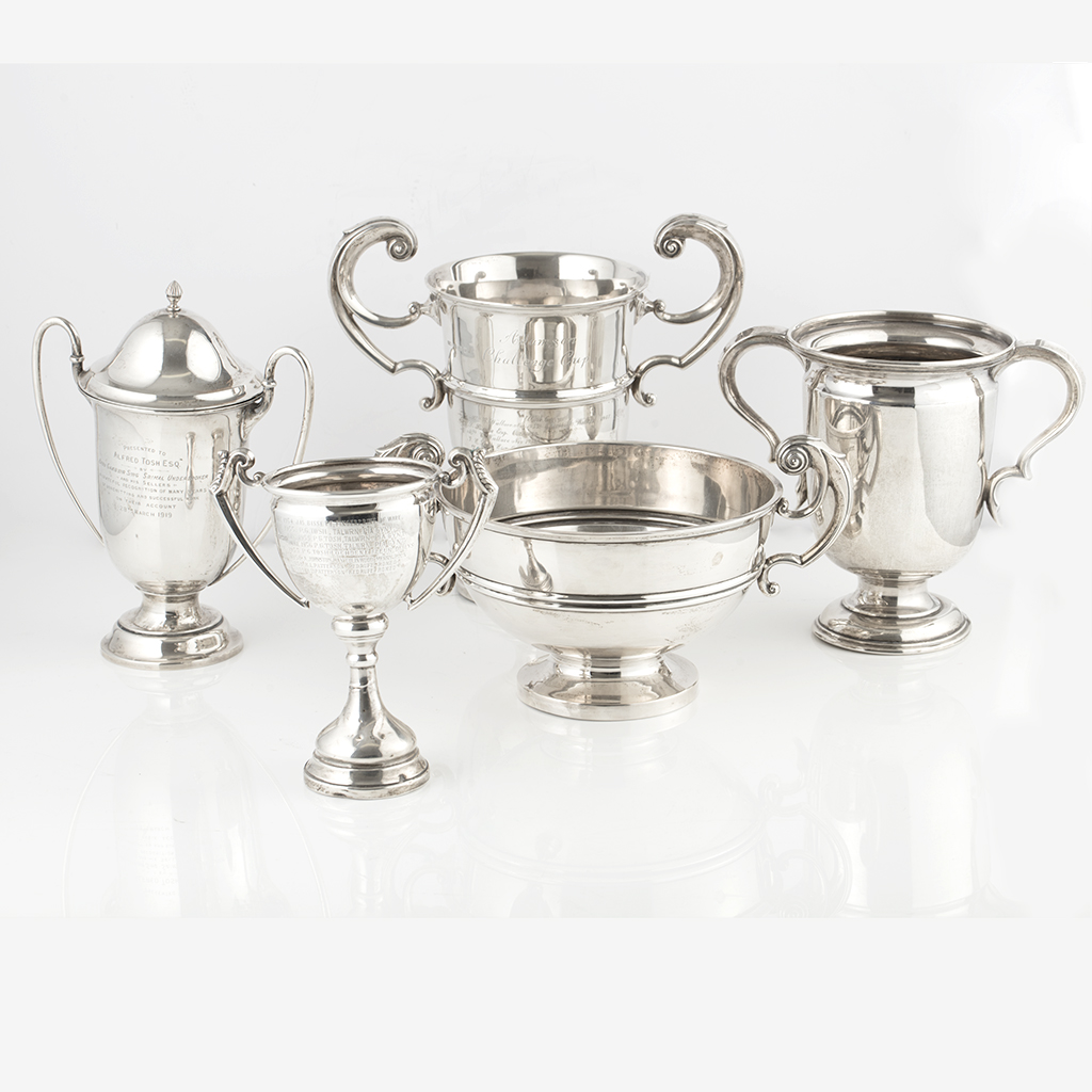 Appraisal: A collection of five silver trophies of various sizes and