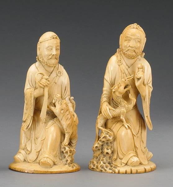 Appraisal: Two tinted ivory figures of luohan th Century Each dressed