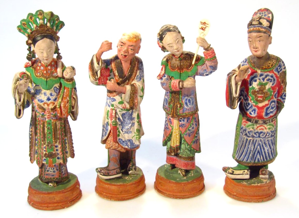 Appraisal: Four various Ming style bisque figures each in oriental dress