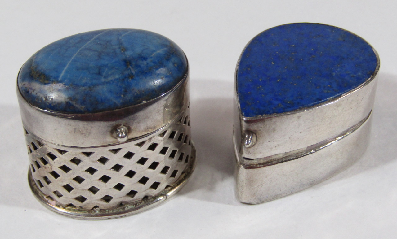 Appraisal: Two continental pill boxes in white metal marked