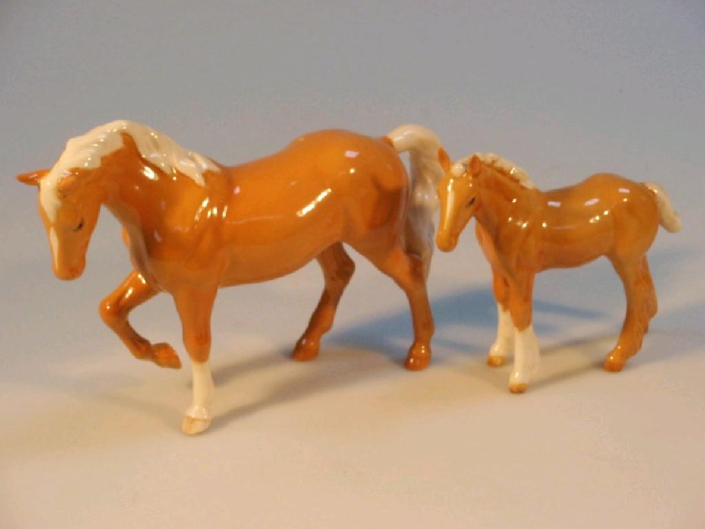 Appraisal: A Beswick stocky jogging mare palomino gloss the third version