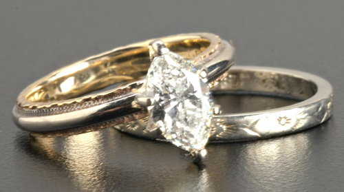 Appraisal: Marquise-cut diamond solitaire with a diamond ring band Lively diamond