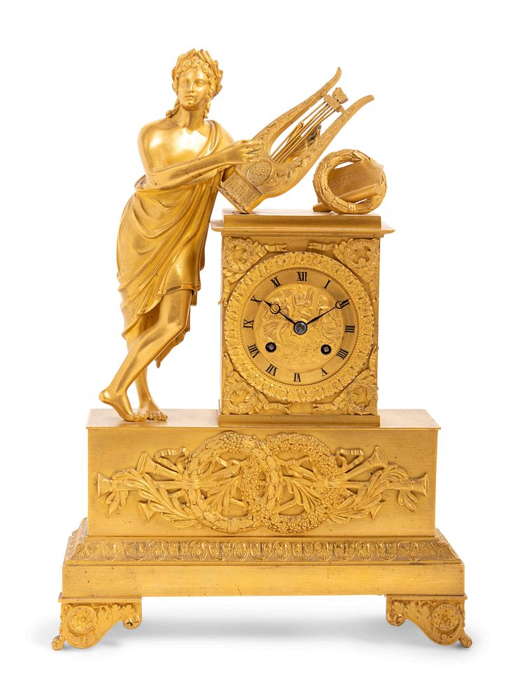 Appraisal: An Empire Gilt Bronze Figural Mantel Clock An Empire Gilt