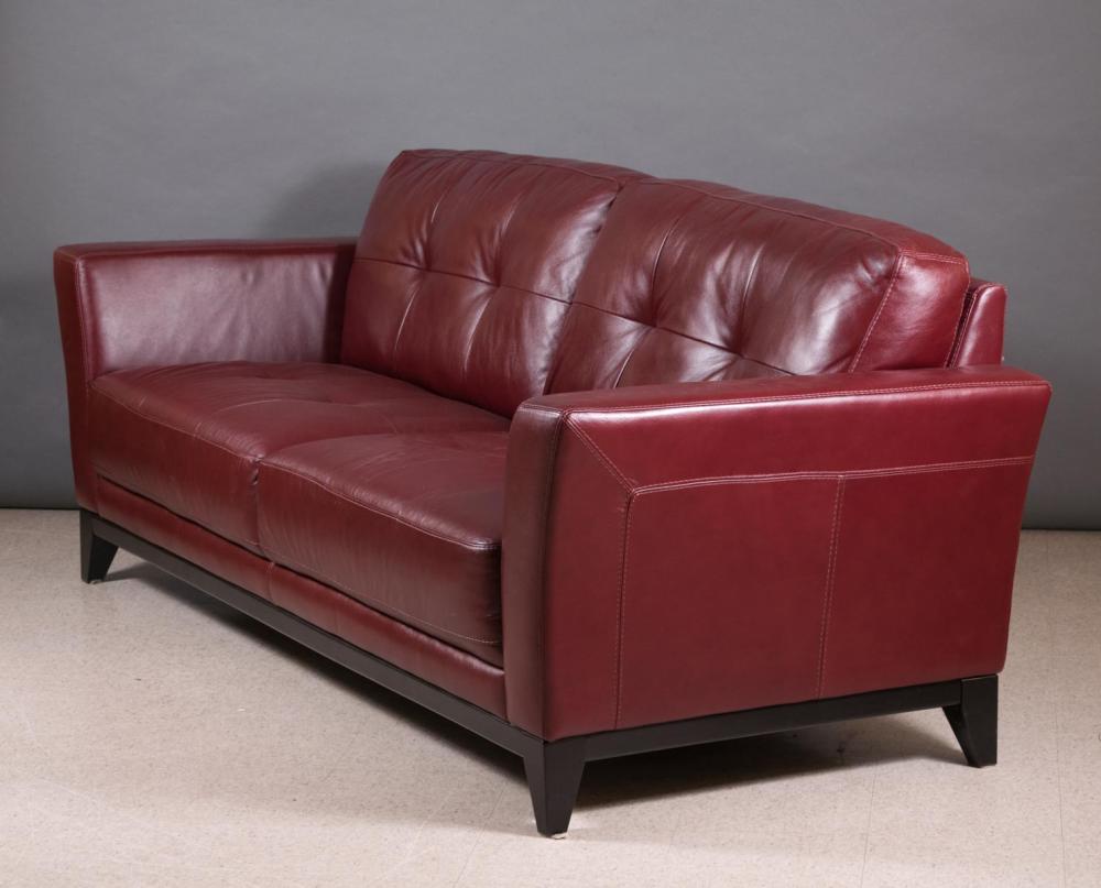 Appraisal: A CONTEMPORARY ITALIAN BURGUNDY LEATHER SOFA Chateau D'Ax Lentate sul