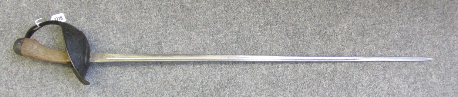 Appraisal: A Cavalry Officer's sword circa impressed marks slightly curved steel