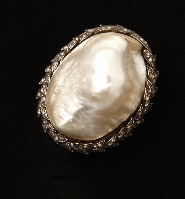 Appraisal: An antique hallow blister pearl and diamond brooch An antique