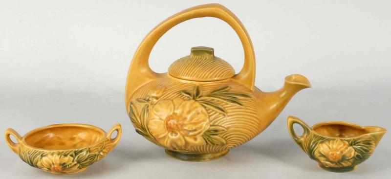 Appraisal: Roseville -Piece Yellow Peony Tea Set Description