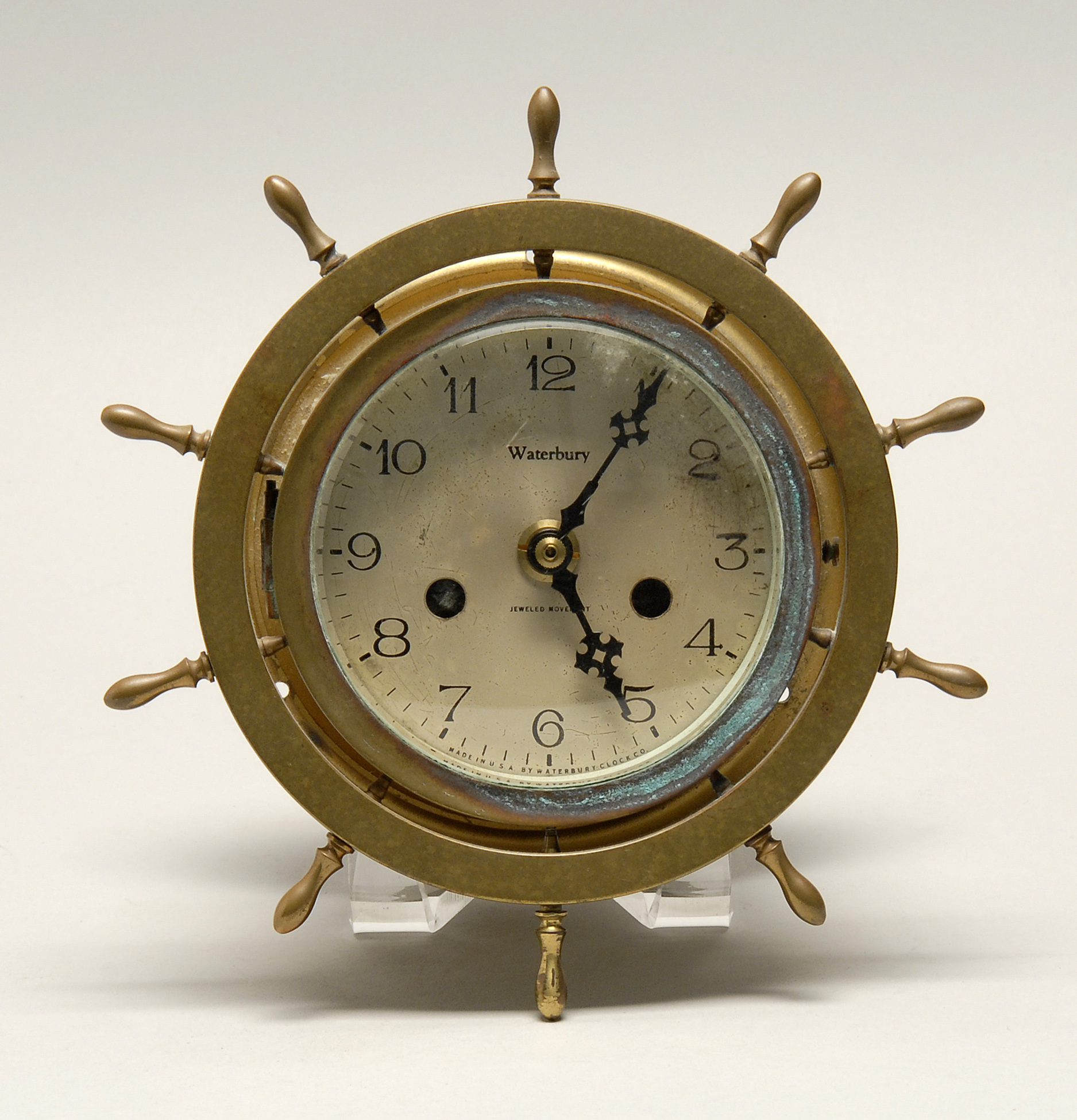 Appraisal: WATERBURY BRASS SHIP'S CLOCK In the form of a ship's