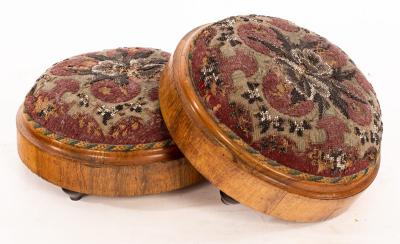 Appraisal: A pair of th Century circular rosewood footstools the tops