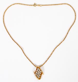 Appraisal: DIAMOND AND KT GOLD PENDANT ON CHAIN DIAMOND AND KT