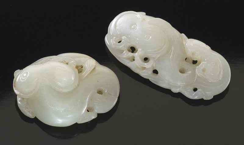 Appraisal: Chinese carved white jade togglesdepicting catfish Largest ''H Circa -