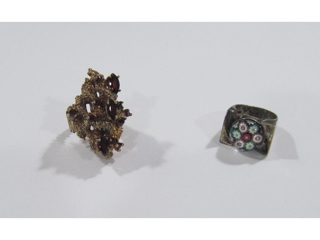 Appraisal: Lot comprising yellow and garnet bark effect ring and a