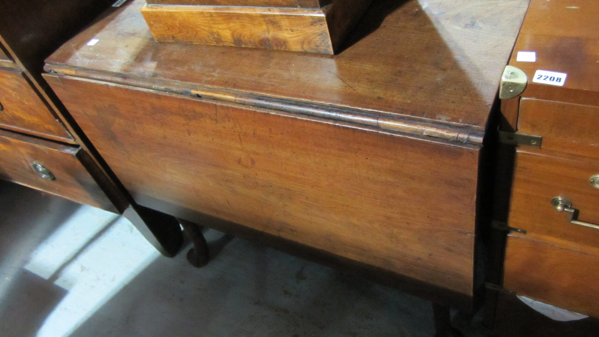 Appraisal: A th century mahogany table with a single drop flap