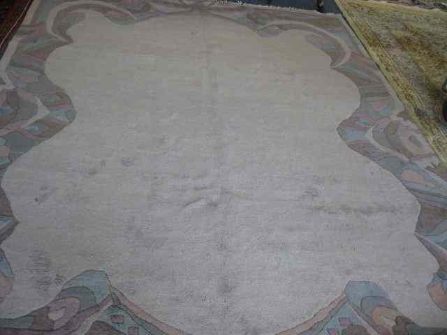 Appraisal: Chinese Handmade Sculptured Room Size rug wool pastel border on