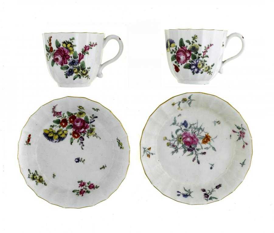 Appraisal: A PAIR OF WORCESTER FLUTED COFFEE CUPS AND SAUCERS enamelled