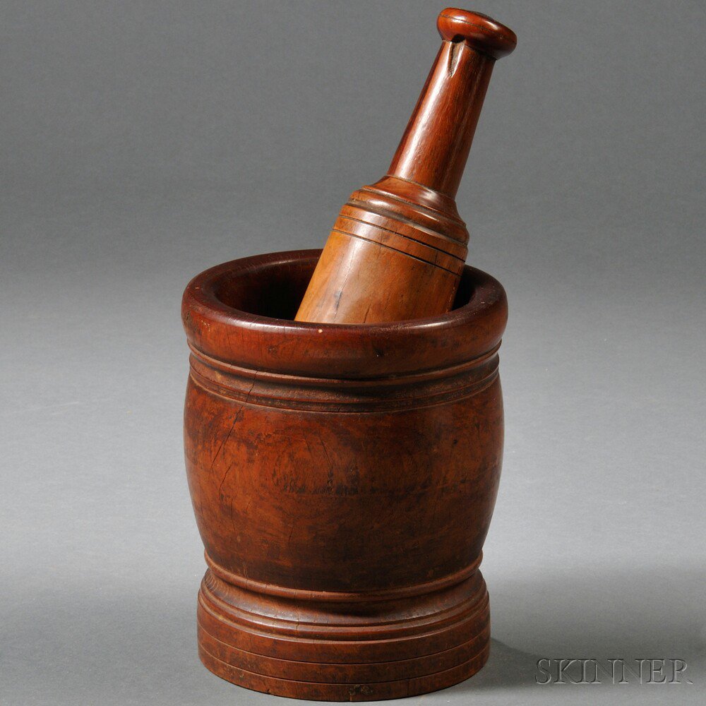 Appraisal: Turned Lignum Vitae Mortar and Pestle th century the bottom