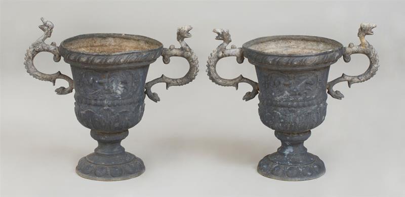 Appraisal: PAIR OF CAST LEAD TWIN SERPENT HANDLED URNS x in