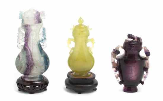 Appraisal: Three Chinese Carved Hardstone Lidded Vases each of baluster form