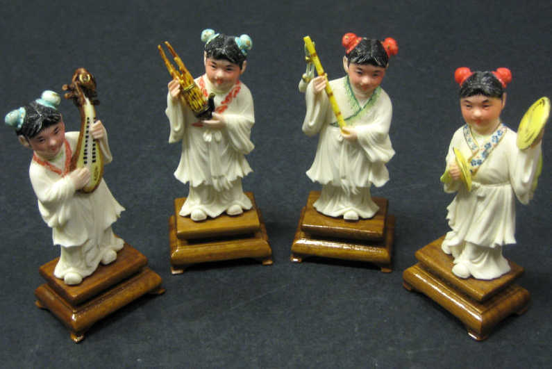 Appraisal: FOUR CHINESE IVORY CHILDREN MUSICIANS Post revolutionary each carved standing